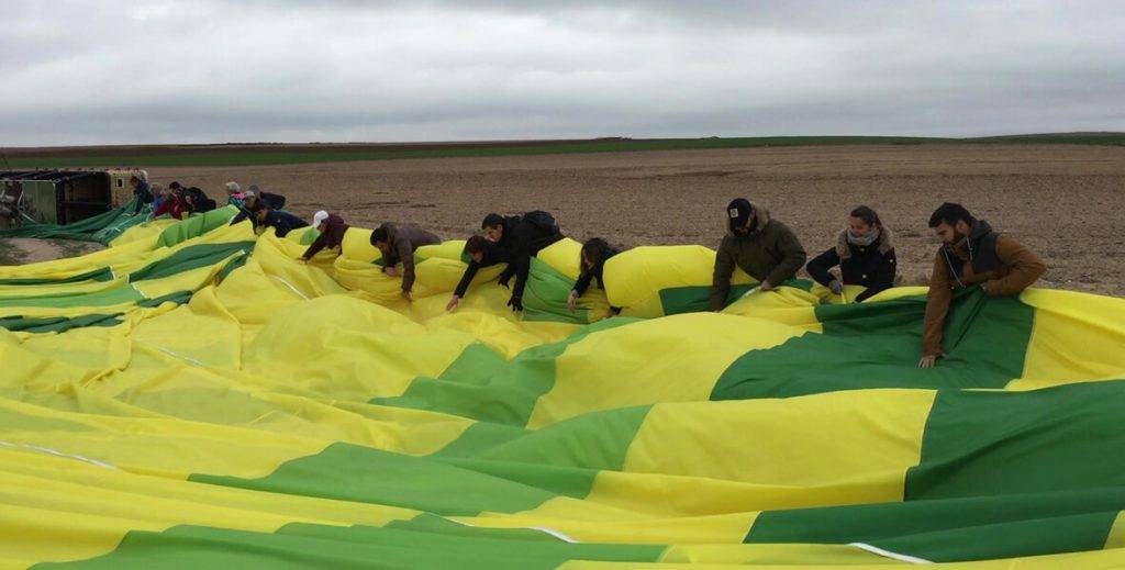 Ayudar a recoger tras la vuelta en globo